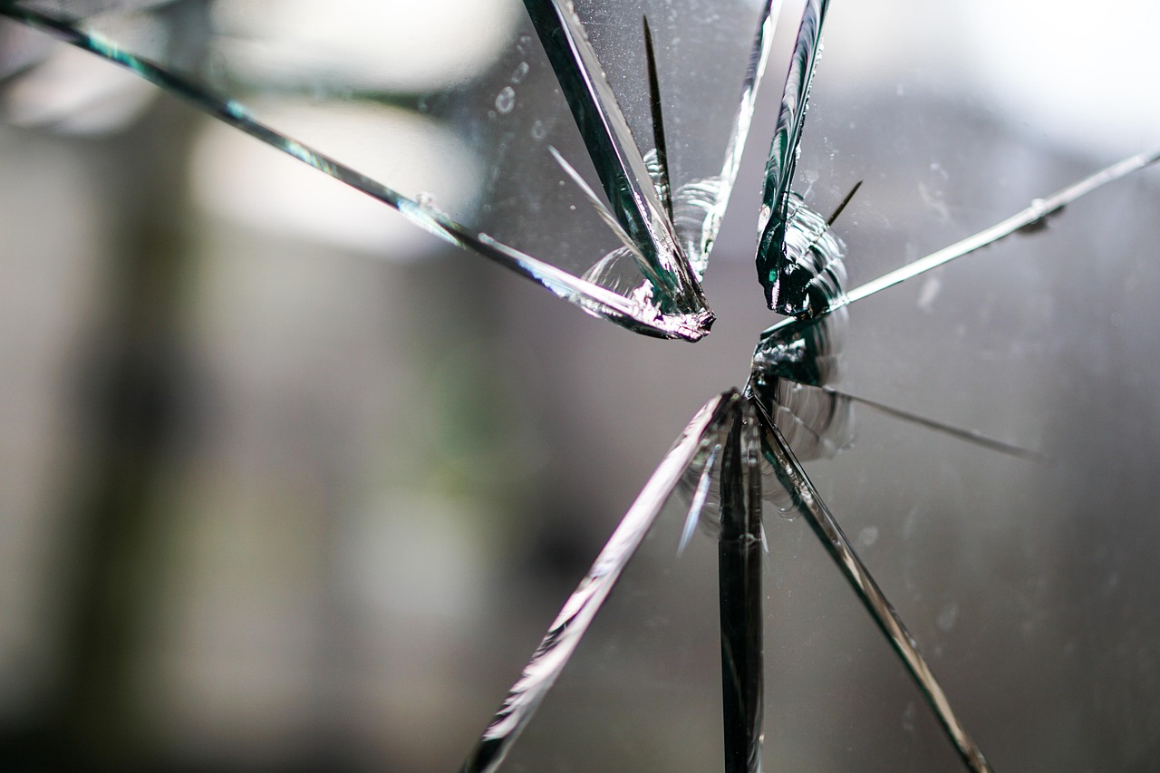 Image of shattered glass pane - Aggressive Injury Lawyer